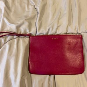 Pink furla wristlet pouch